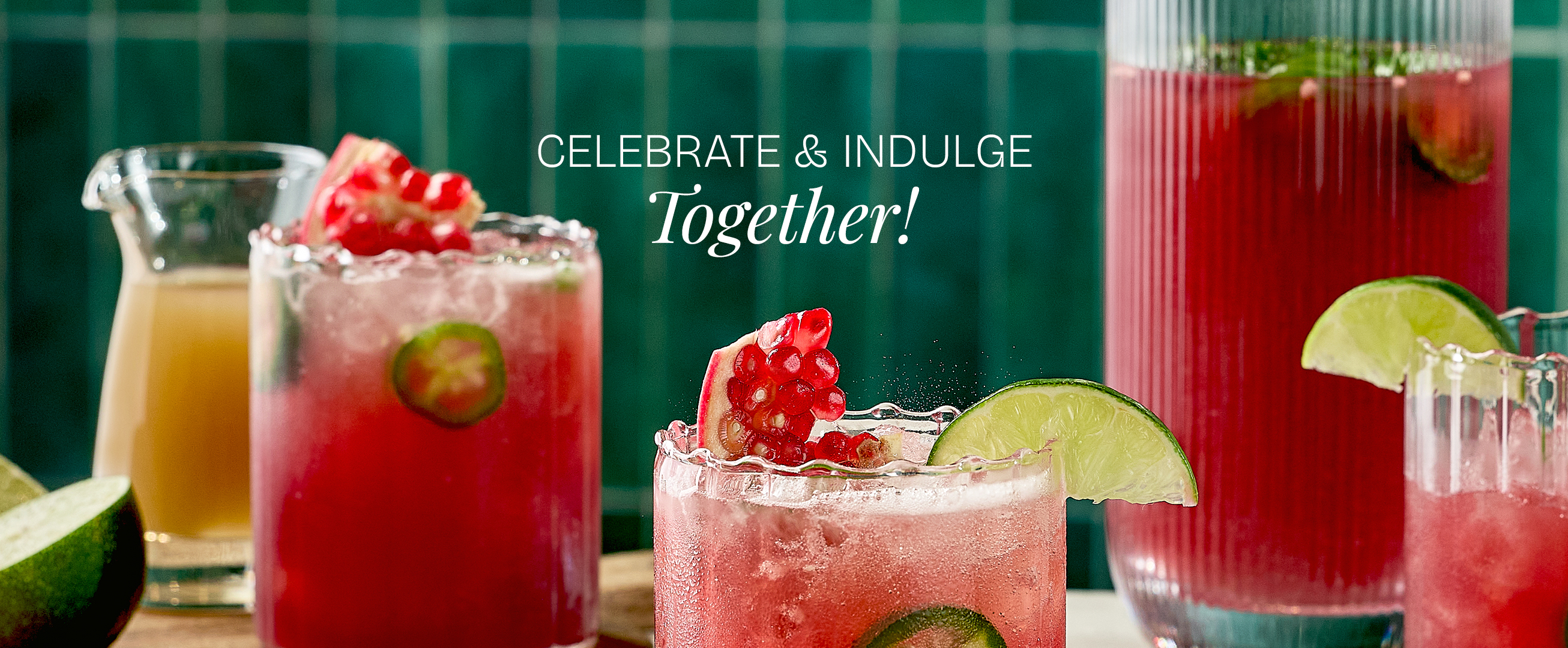 Pomegranate fizz with text Celebrate and indulge together