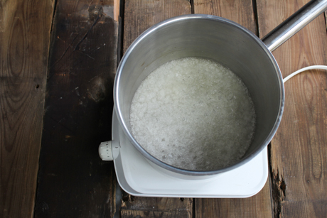 3. Cook sugar and water slowly over low heat