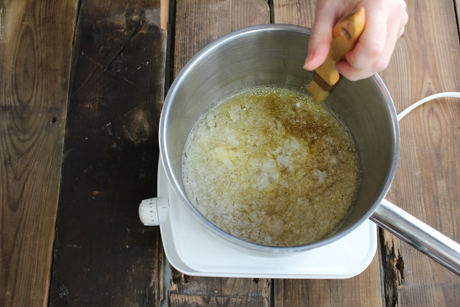 5. Brush sides of pan with water