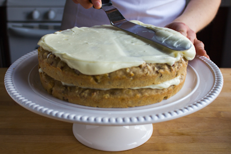 27. Icing your layer cake with cream cheese frosting